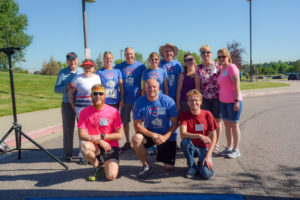 5K runners posing for a photo.