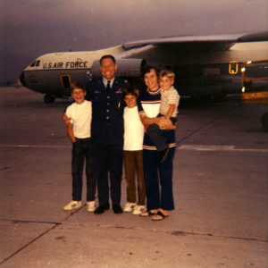 The whole Anderson family posing on an airfield in 1971.
